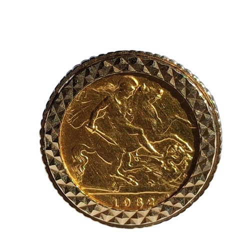 770 - A 9CT GOLD RING SET WITH A 22CT GOLD COIN (SOVERIGN)