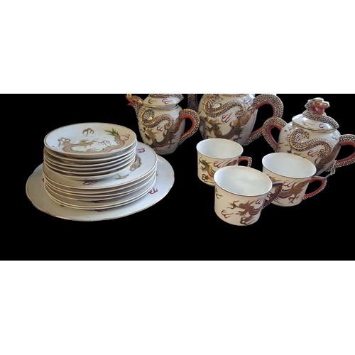 92 - ANTIQUE CHINESE DRAGON PORCELAINE TEA SERVICE