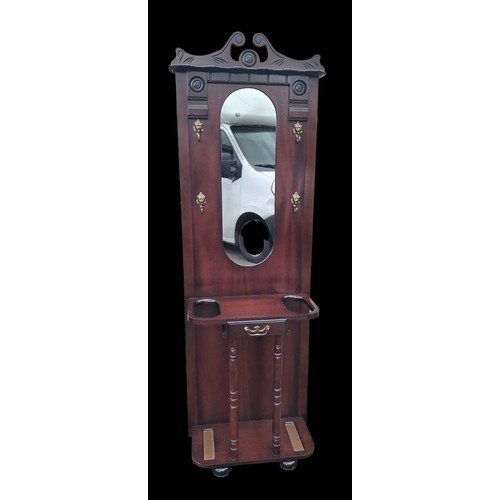 64 - A MIRRORED HALL STAND WITH LION HEAD HOOKS