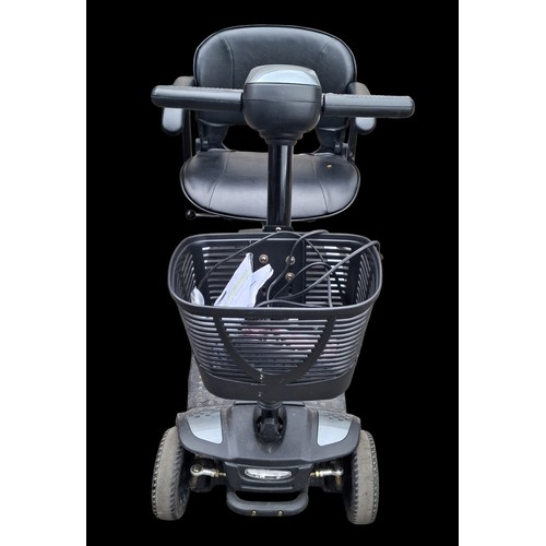 101 - A MOBILITY SCOOTER (NEEDS SERVICED)