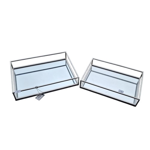 72 - A SET OF GRADUATED MIRRORED DRINKS TRAYS