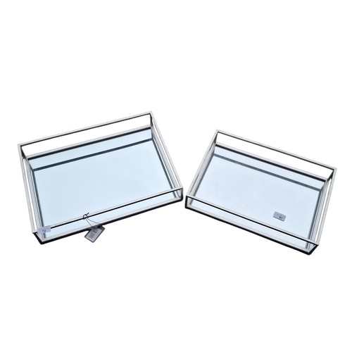 72 - A SET OF GRADUATED MIRRORED DRINKS TRAYS