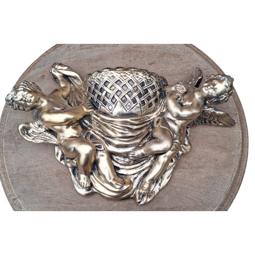 97 - A GILT CHERUB WALL POCKET