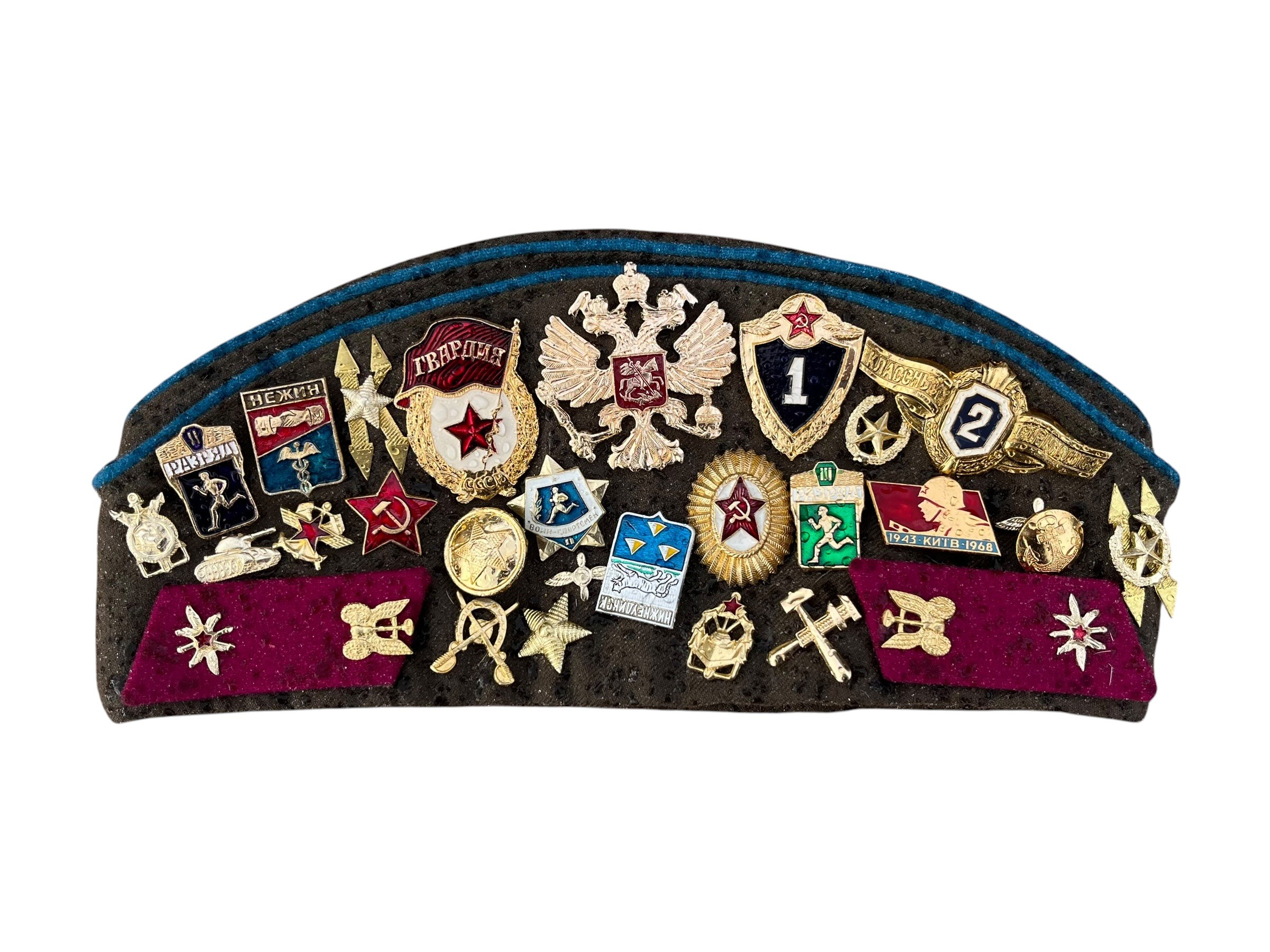 A RUSSIAN MILITARY STYLE HAT WITH A LARGE COLLECTION OF RUSSIAN THEMED ...