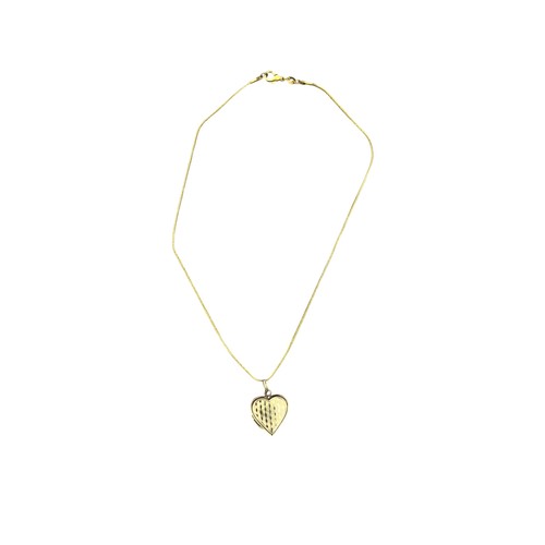 A ROLLED GOLD HEART LOCKET ON MATCHING CHAIN