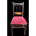 A GOTHIC STYLE CHAIR