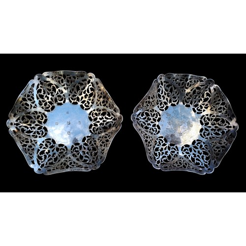 A PAIR OF IRISH SILVER BASKETS WITH ADDITIONAL HALLMARK