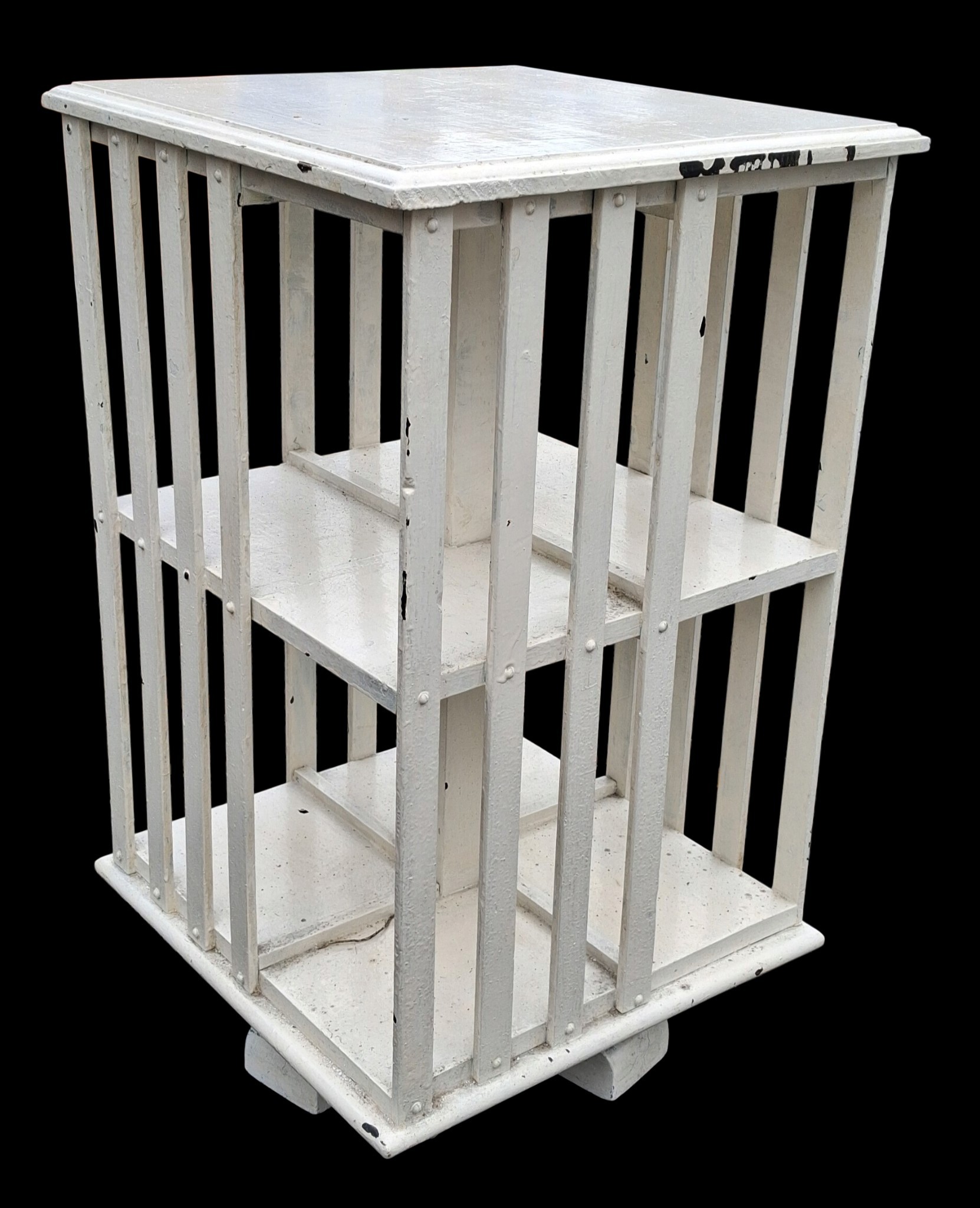 A SMALL EDWARDIAN REVOLVING BOOKCASE