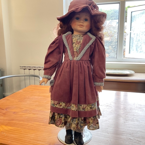 70 - Vintage Doll on Stand: Collectors Item - Porcelain

Size: 55cm tall