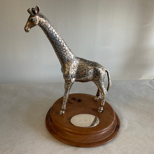 245 - Silver Giraffe - WWF Guernsey 1999

1,226 grams of silver, 2 x 4mm Sapphires for eyes, Base elm from... 