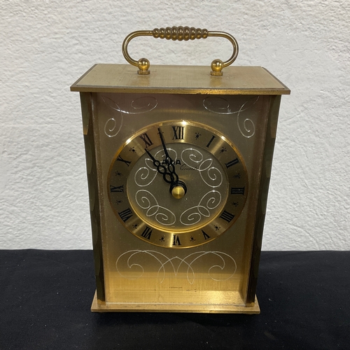 135 - Avia Quartz Brass Carriage Clock

Size: 10cm x 13cm