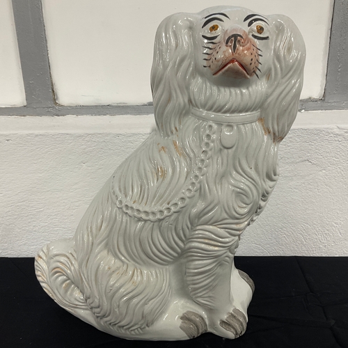 136 - English White Staffordshire Dog Figurine

Size: 36cm Tall