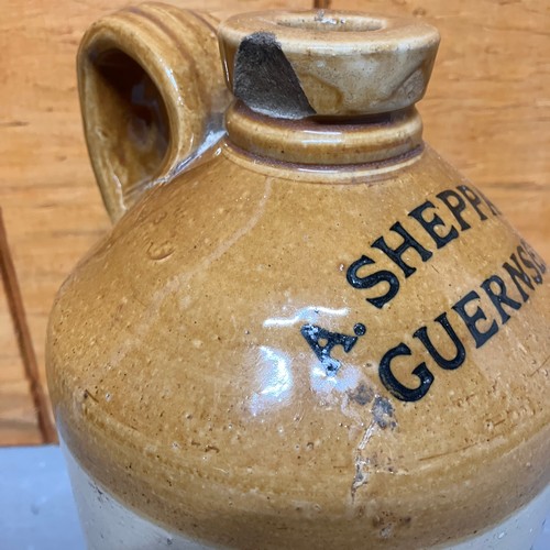 243 - A. Sheppard Flagon. Half gallon size

Slight damage to rim 

Size: 26cm tall x 15cm diameter