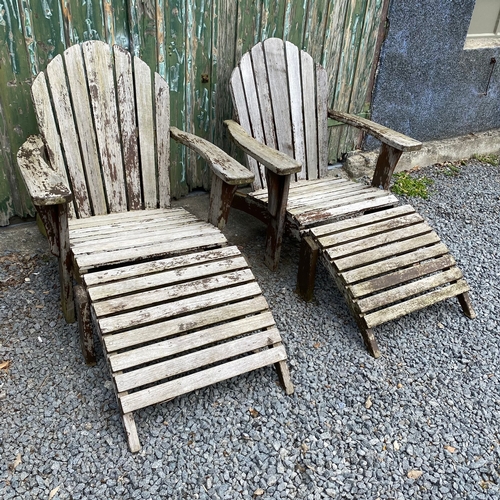 301 - Two Teak Adirondack chairs with foot rests