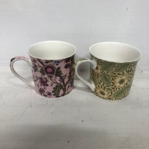 128 - Selection of Mugs and Blue Vase (5)

To include Cath Kidson, V & A and Guernsey Pottery