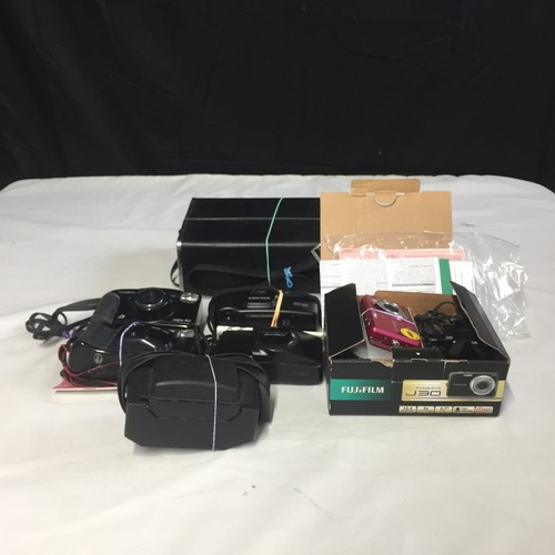 159 - Photographic Rummage Box. Seven Cameras. All untested. See details below.
 
1. Olympus mju zoom 115
... 