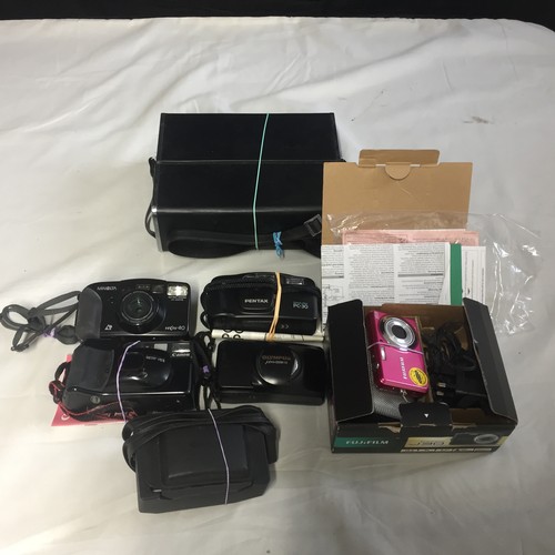 159 - Photographic Rummage Box. Seven Cameras. All untested. See details below.
 
1. Olympus mju zoom 115
... 