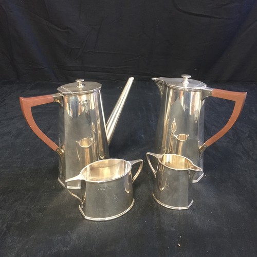 182 - Four Silver Art Deco Items - Coffee and Tea Pots, Milk Jug and Sugar Bowl.

Believed to be Gladwin 1... 