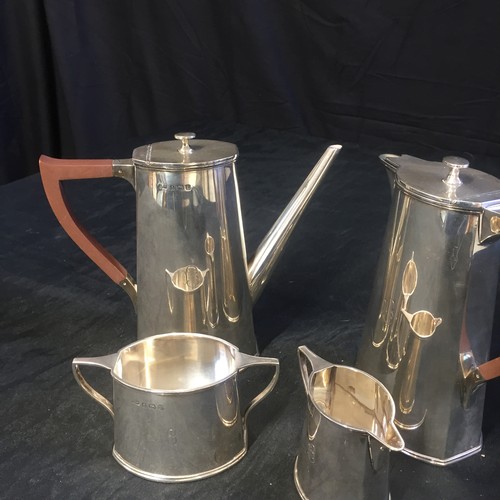 182 - Four Silver Art Deco Items - Coffee and Tea Pots, Milk Jug and Sugar Bowl.

Believed to be Gladwin 1... 