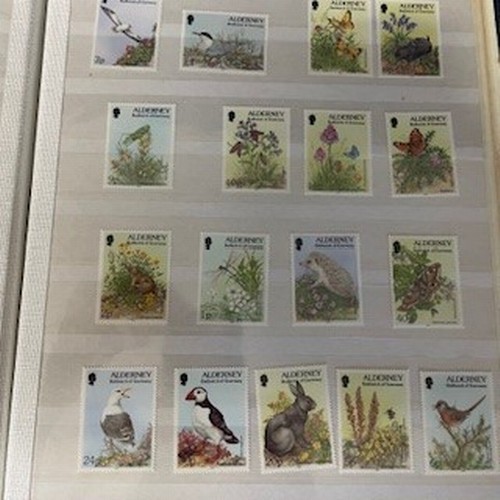 339 - Stamp Albums x 4 
to include Guernsey Jersey & Christmas Editions - unchecked