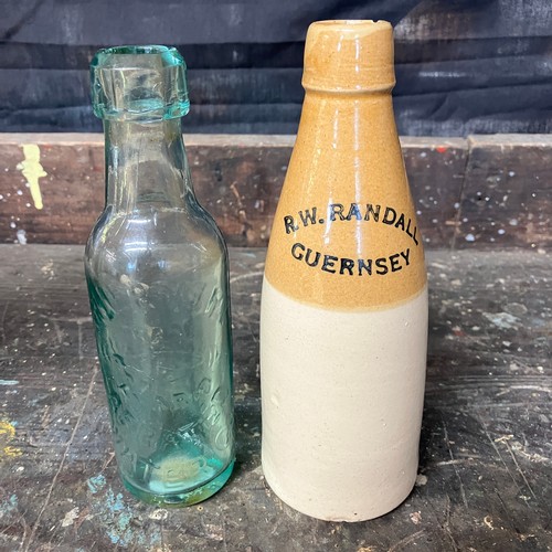 400 - R. W. Randall Beer Guernsey bottle & Guernsey Aerated Water Bottle (Glass)

Beer Bottle size:  19cm
... 