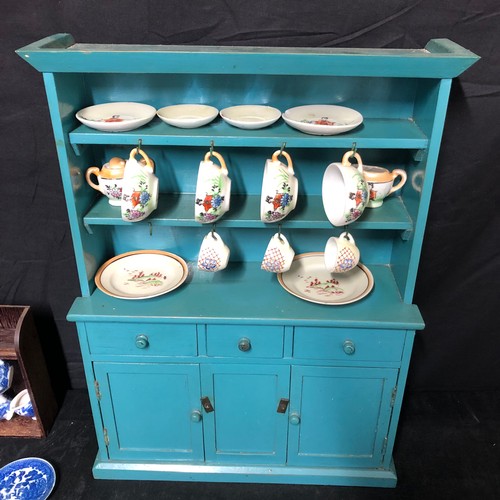 420 - Two Miniature Tea Sets with Hanging Cupboard a/f

Size: 34cm x 11cm x 47cm