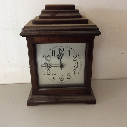 148 - Wooden Quartz Mantle Clock.
Size 36cm High, 26cm wide