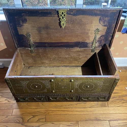 91 - Hardwood Brass Bound and Studwork Zanzibar Chest. 19th century, with decorated pierced brass lock cl... 