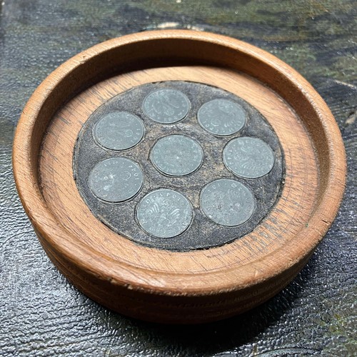 500 - Wooden Wine Coaster with 1 Reichspfennig Coin Detail. Age Unknown.

Coaster has Eight Reichspfennig ... 