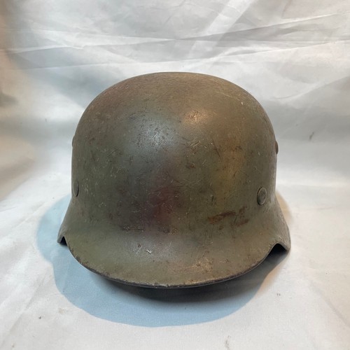 7 - World War II German M-35 Single Decal Steel Helmet
(Decal touched up) with Strap and Liner
Size 58
N... 