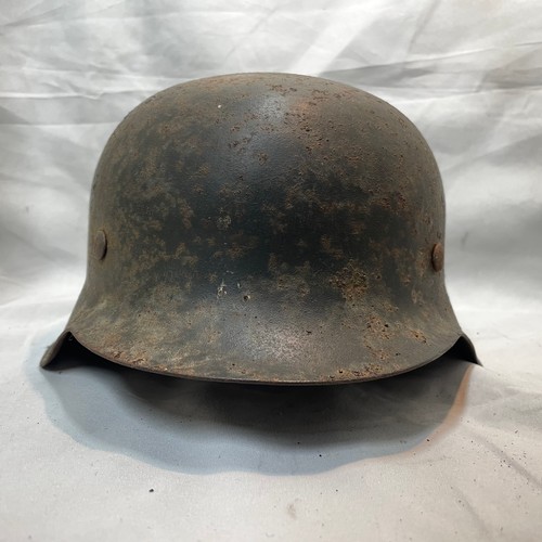 11 - World War II German Army M-42 Single Decal Helmet
Quite worn - No Liner or Strap