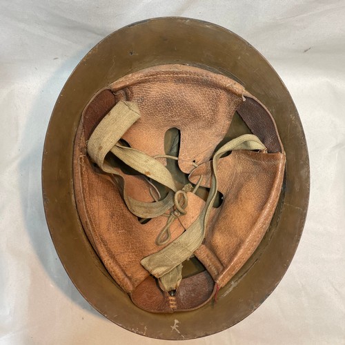 13 - World War II Japanese Army Helmet
with Strap and Liner