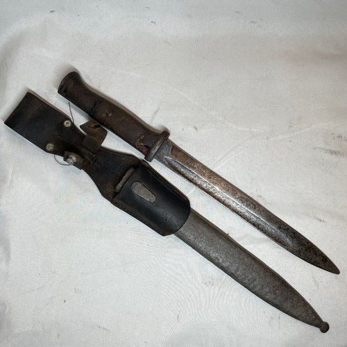 27 - World War II German Bayonet, Scabbard and Frog
Believed to be an M1884-98 III Bayonet from WW2