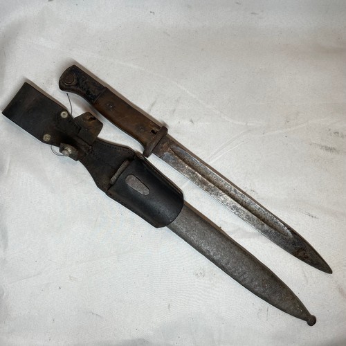 27 - World War II German Bayonet, Scabbard and Frog
Believed to be an M1884-98 III Bayonet from WW2