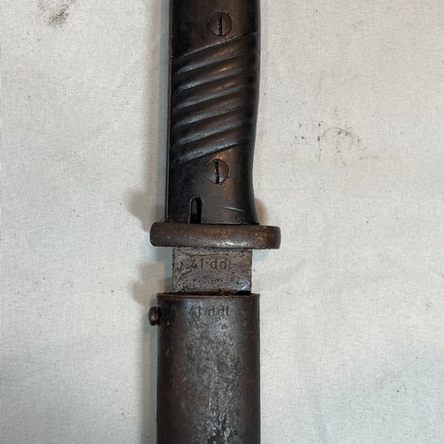 29 - K98 Bayonet with scabbard and its leather frog.  
Matching number 7854 on the bayonet and scabbard.
... 