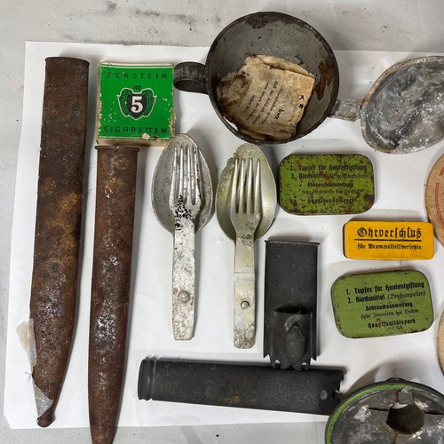 134 - World War II German Rummage Box (2)
to include tins, beer mats, sheaths