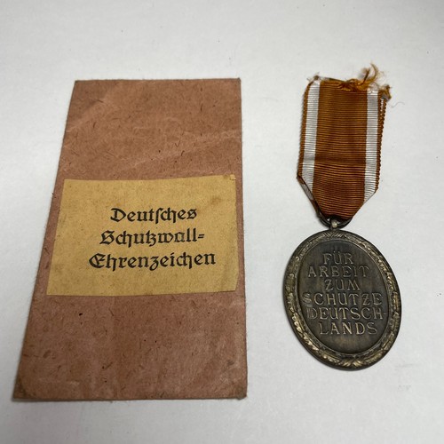 149 - World War II German West Wall Medal and Envelope