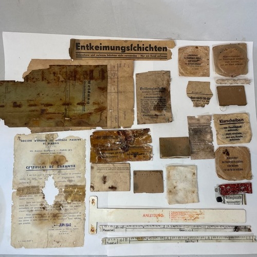 101 - A Box of World War II German Repair Patches and Other Parts