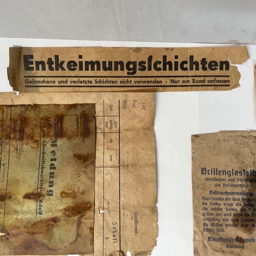 101 - A Box of World War II German Repair Patches and Other Parts