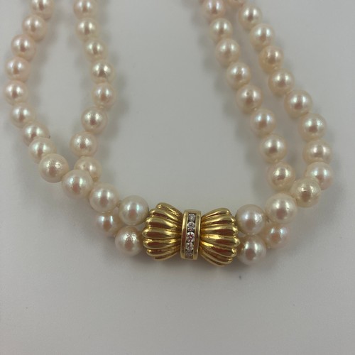 4 - Japanese Cultured Pearls, 5.5mm High Lustred in Uniform Shape Twin Strands Knotted and set with an 1... 