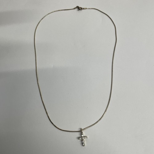 29 - 925 Silver Necklace With Cross Pendant.

Pendant Unmarked. 
Total Weight: 3.49g.