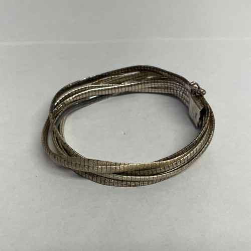 32 - Silver 925 Vintage 7 Layered Bracelet.

Total Weight: 32.5g.