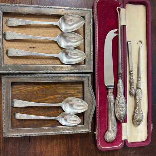 9 - Assortment of Sterling Silver Items.

Including:-
1. Two Frames.
2. Five Spoons (55g).
3. Four Silve... 