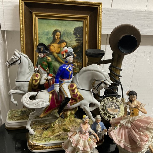 16 - Rummage Box.
To include: Antique Brass Candle Stick Rotary Dial Vintage Telephone, Napoleon Figurine... 