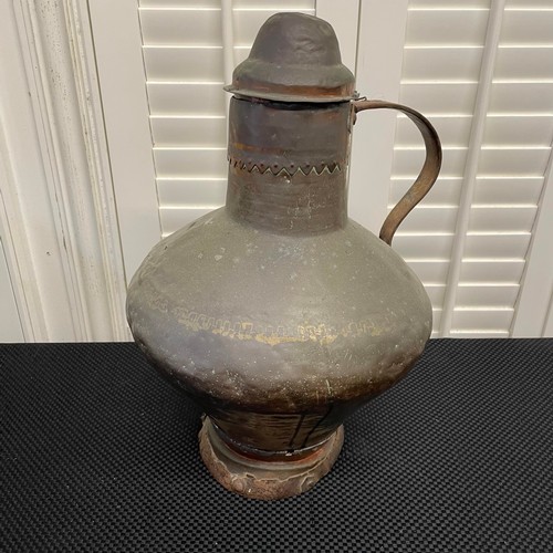 34 - Antique Large Copper Hand Forged Jug With Lid.

Diameter:29cm H:43cm.