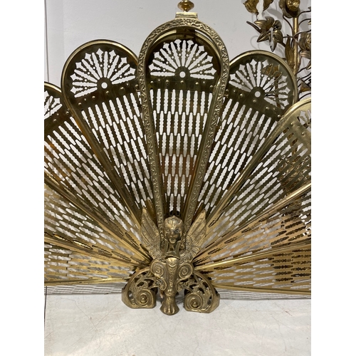 79 - Three Vintage Brass homewares including ornate fan fireguard 60cm x 96cm, decorative candelabra 100c... 