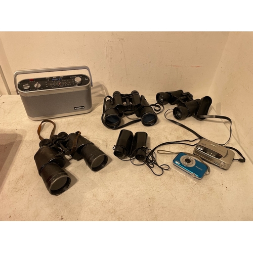 114 - Collection of Binoculars , radio + cameras