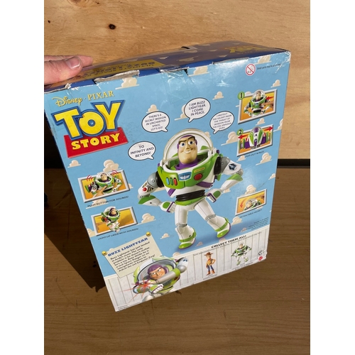 124 - 2 Toy Story Buzz Light Year Toys in boxes unplayed