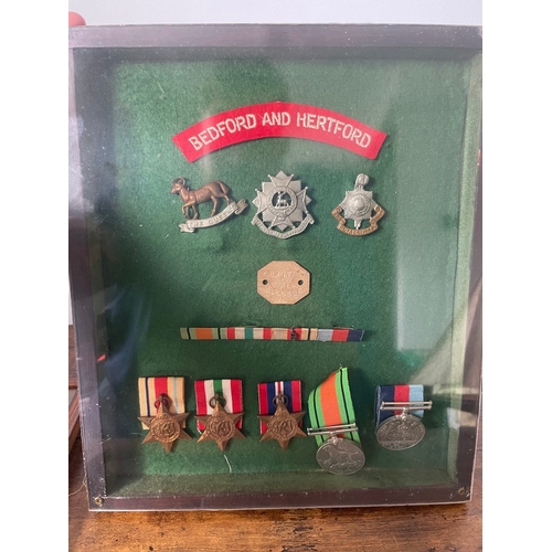 193 - Framed Collection of Five WW2 Military Medals inc Bedford & Hertford, The Queens, Royal Sussex Regim... 