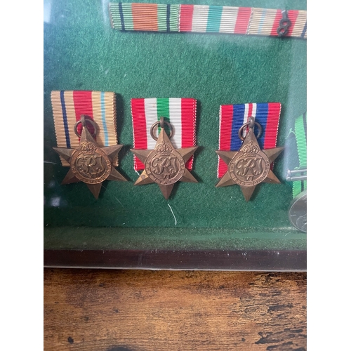 193 - Framed Collection of Five WW2 Military Medals inc Bedford & Hertford, The Queens, Royal Sussex Regim... 
